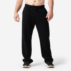 Spodnie dresowe męskie Domyos. Niebieskie spodnie sportowe męskie DOMYOS, l, bez wzorów, z bawełny, na fitness i siłownię. Za 149.99 zł.