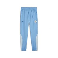 Spodnie d'avant-match PUMA Manchester City 23/24 Royal Blue Silver Sky. Niebieskie spodnie sportowe męskie Puma, bez wzorów, z materiału, do piłki nożnej. Za 269.55 zł.