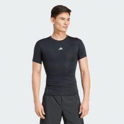Koszulka TECHFIT Compression Training. Czarne buty sportowe męskie Adidas, z materiału, bez zapięcia, na fitness i siłownię, techfit (adidas). Za 149.00 zł.