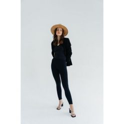 Legginsy modelujące do jogi Moonholi Malibu Evenings z wysokim stanem. Czarne bielizna termoaktywna damska MOONHOLI, m, bez wzorów, bez ramiączek. Za 359.00 zł.