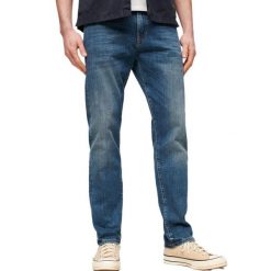 Dżinsy slim fit z bawełny organicznej Superdry. Niebieskie jeansy męskie Superdry., eleganckie. Za 368.95 zł.