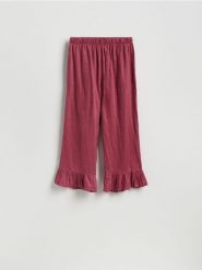 Lniane spodnie - brudny róż. Czerwone spodnie materiałowe damskie Reserved, l, bez wzorów. Za 199.99 zł.