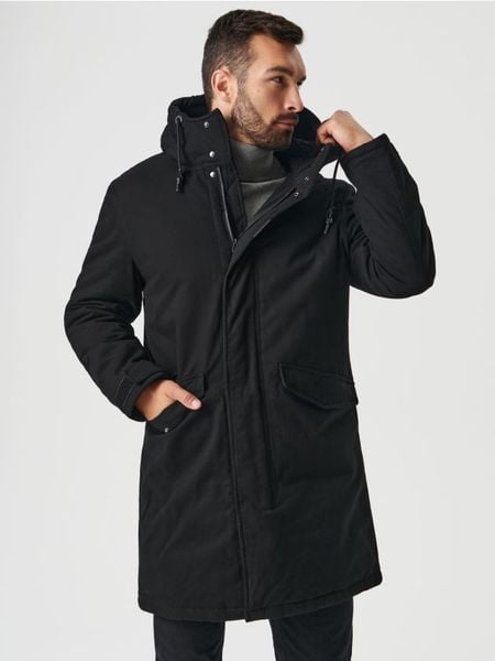 Kurtka parka z kapturem - czarny. Czarne kurtki męskie Sinsay, l, bez wzorów, z kapturem. Za 199.99 zł.