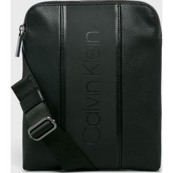 Calvin Klein - Saszetka. Czarne saszetki męskie Calvin Klein, z materiału. Za 329.90 zł.