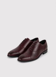 PAKO LORENTE – Bordowe buty męskie typu brogsy. Czerwone eleganckie półbuty Pako Lorente, ze skóry, eleganckie, bez zapięcia. Za 399.99 zł.
