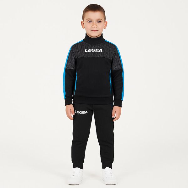 Komplet dla chłopca DAMASCO JR. Czarne spodnie sportowe dla chłopców Legea, bez wzorów, z dresówki, sportowe, długie, na jogę i pilates. W wyprzedaży za 84.00 zł.
