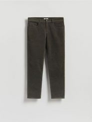 Bawełniane spodnie slim fit - jasny zielony. Zielone spodnie materiałowe męskie Reserved, l, bez wzorów, z bawełny. Za 199.99 zł.