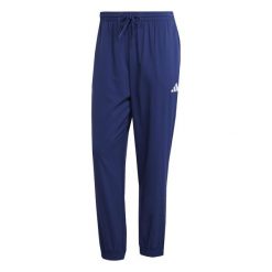 Spodnie do biegania adidas ESSENTIALS SMALL LOGO STANFORD. Niebieskie spodnie sportowe męskie Adidas, m, bez wzorów, z materiału, do biegania. Za 200.60 zł.