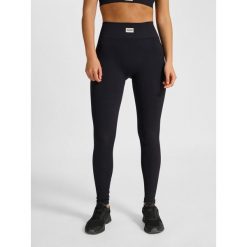 Damskie legginsy Hummel Pulse. Czarne legginsy sportowe damskie Hummel, bez wzorów, na fitness i siłownię. Za 175.00 zł.