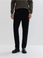 Bawełniane spodnie slim fit - czarny. Czarne spodnie materiałowe męskie Reserved, l, bez wzorów, z bawełny. Za 199.99 zł.