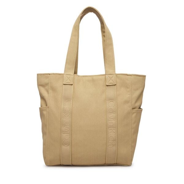 Torebka Calvin Klein. Brązowe torebki do ręki damskie Calvin Klein, bez wzorów, klasyczne, bez dodatków. Za 406.99 zł.