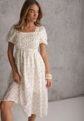 Jasnobeżowa Rozkloszowana Sukienka z Tencelu w Stylu Baby Doll w Kwiatowy Print Harele. Brązowe sukienki dla dziewczynek Renee, na lato, bez wzorów, bez ramiączek, krótkie. Za 119.99 zł.
