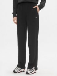 Reebok Spodnie dresowe Classics IL4647 Czarny Relaxed Fit. Czarne spodnie dresowe damskie Reebok, xl, bez wzorów, z bawełny. Za 159.99 zł.