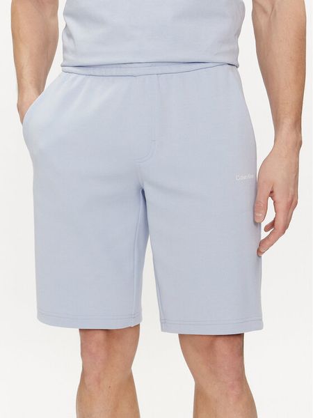 Calvin Klein Szorty sportowe Micro Logo K10K111208 Niebieski Regular Fit. Niebieskie krótkie spodenki sportowe męskie Calvin Klein, l, bez wzorów, z bawełny. Za 209.99 zł.