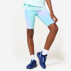 Legginsy dziecięce krótkie. Czerwone legginsy dla dziewczynek Decathlon, bez wzorów, z elastanu, sportowe. Za 44.99 zł.