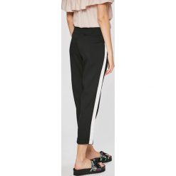 Answear - Spodnie. Czarne legginsy damskie ANSWEAR, l, bez wzorów, z poliesteru. W wyprzedaży za 39.90 zł.