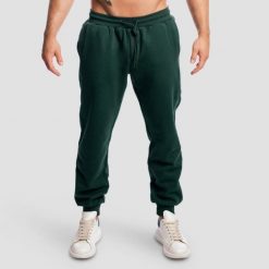 Spodnie męskie fitness oversize ze sznurkiem zielone Base. Zielone spodnie sportowe męskie GYMBEAM, m, bez wzorów, z bawełny, na fitness i siłownię. Za 140.90 zł.