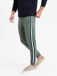 Męskie dresowe spodnie z lampasami i ściągaczami na nogawkach oliwkowe V2 OM-PASK-0258 L. Zielone spodnie sportowe męskie Ombre, l, bez wzorów, z dresówki. Za 302.57 zł.
