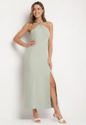 Jasnozielona Sukienka z Wiskozą z Odkrytymi Plecami i Wiązaniem Zdobiona Broszką Nalorise. Zielone sukienki damskie Born2be, l, z aplikacjami, z wiskozy, eleganckie, bez kołnierzyka, bez ramiączek, maxi. Za 89.99 zł.