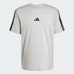 Koszulka Essentials 3-Stripes Single. Białe koszulki sportowe męskie Adidas, s, z aplikacjami, z bawełny, bez kołnierzyka, bez ramiączek, na fitness i siłownię. Za 119.00 zł.