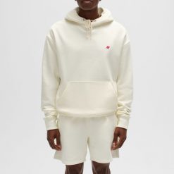 Bluza męska New Balance MADE in USA MT43546SST – beżowa. Brązowe bluzy męskie New Balance, m, bez wzorów, z bawełny, z kapturem. Za 749.99 zł.