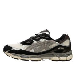 Buty do chodzenia dla dorosłych ASICS Gel-NYC Ivory Clay Grey. Czarne obuwie sportowe damskie Asics, bez wzorów, ze skóry, trekkingowe. Za 1,461.98 zł.