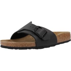 Klapki damskie Birkenstock Catalina. Czarne klapki damskie Birkenstock, bez wzorów, z materiału, bez obcasa. Za 501.00 zł.