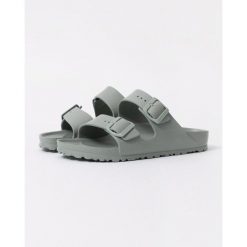 Klapki damskie Birkenstock Arizona Eva Pure Sage. Niebieskie klapki damskie Birkenstock, bez wzorów, z materiału, klasyczne, bez obcasa. Za 331.00 zł.