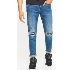 Jeansy COMFORT - Granatowy. Niebieskie jeansy męskie Cropp. Za 129.99 zł.