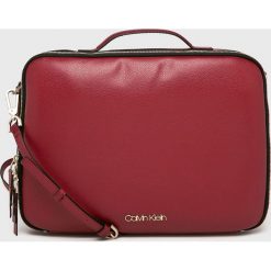 Calvin Klein - Torba na laptopa. Brązowe torby na laptopa damskie Calvin Klein, w paski, z materiału. Za 579.90 zł.