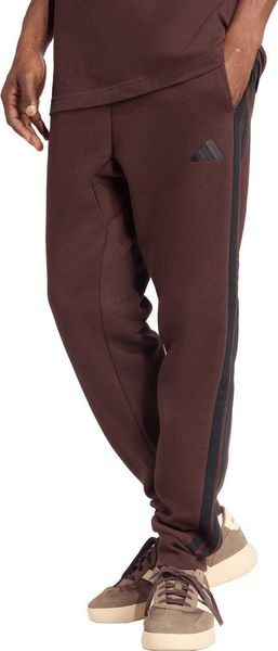 Spodnie męskie adidas Essentials 3-Stripes Fleece brązowe JX0749 M. Brązowe spodnie sportowe męskie Adidas, m, bez wzorów. Za 331.31 zł.