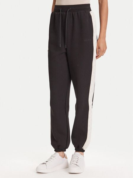 Guess Spodnie dresowe V5YB02 KB3P2 Czarny Regular Fit. Czarne spodnie dresowe damskie Guess, s, z aplikacjami, z bawełny. Za 206.99 zł.