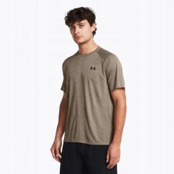 T-Shirt Męski Sportowy Under Armour Tech Textured. Brązowe koszulki sportowe męskie Under Armour, m, bez wzorów, bez kołnierzyka, bez ramiączek, do biegania. W wyprzedaży za 88.76 zł.