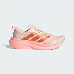 BUTY DO BIEGANIA SUPERNOVA GLIDE. Fioletowe obuwie sportowe damskie Adidas, bez wzorów, z gumy, do biegania. Za 569.00 zł.