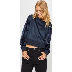 Guess Jeans - Bluza. Niebieskie bluzy damskie Guess Jeans, l, z aplikacjami, z dzianiny, bez kaptura. W wyprzedaży za 139.90 zł.
