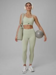 4F Legginsy treningowe bezszwowe damskie - zielone XS/S. Zielone legginsy damskie 4f, s, bez wzorów, ze skóry, z podwyższonym stanem, długie, na fitness i siłownię. Za 149.99 zł.