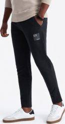 Ombre Męskie spodnie dresowe z logotypem czarne V1 OM-PASK-0167 L. Czarne spodnie sportowe męskie Ombre, l, bez wzorów, z dresówki. Za 149.99 zł.