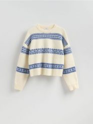 Sweter we wzory - niebieski. Niebieskie swetry damskie Reserved, l, bez wzorów, z dzianiny, bez kołnierzyka, bez ramiączek, bez kaptura. Za 129.99 zł.