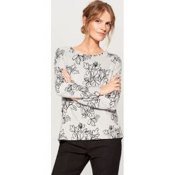 Dzianinowy sweter w kwiaty - Czarny. Czarne swetry damskie Mohito, z dzianiny. Za 89.99 zł.