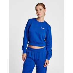 Damska krótka bluza Hummel LGC Shai. Niebieskie bluzy damskie Hummel, m, bez wzorów, z bawełny, bez kaptura. Za 210.55 zł.
