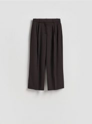 Spodnie carrot fit - ciemnobrązowy. Brązowe spodnie materiałowe damskie Reserved, l, bez wzorów, z tkaniny. Za 139.99 zł.