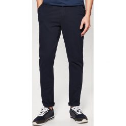 Materiałowe spodnie chino - Granatowy. Niebieskie spodnie materiałowe damskie House, z materiału. Za 49.99 zł.