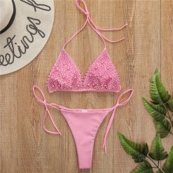 Bikini wiązane regulowane na plażę i basen Gorana. Czarne bikini damskie Intica, na lato, l, bez wzorów. Za 169.00 zł.