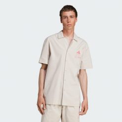 Koszulka Mercedes - AMG Petronas Formula One Team Summer. Brązowe koszulki sportowe męskie Adidas, xl, bez wzorów, z bawełny, bez kołnierzyka, bez ramiączek. Za 439.00 zł.