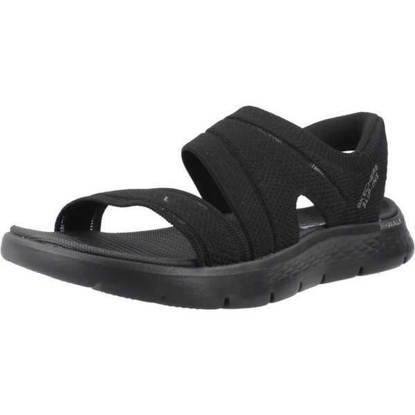 Sandały Skechers Model Slip-ins Go Walk Flex Kolor Czarny. Czarne klapki damskie Skechers, bez wzorów, sportowe, bez zapięcia. Za 279.99 zł.