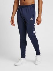 Spodnie do biegania Hummel hmlCORE. Niebieskie spodnie sportowe męskie Hummel, na jesień, m, bez wzorów, z materiału, do biegania. Za 143.00 zł.