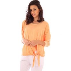 Koszulka w kolorze pomarańczowym. T-shirty damskie marki fille de Coton, z bawełny, klasyczne, z okrągłym kołnierzem. W wyprzedaży za 86.95 zł.