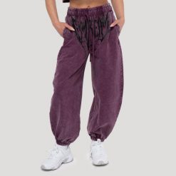Spodnie damskie fitness oversize Raisin Abyss. Czerwone spodnie dresowe damskie GYMBEAM, m, bez wzorów, z bawełny, na fitness i siłownię. Za 139.90 zł.