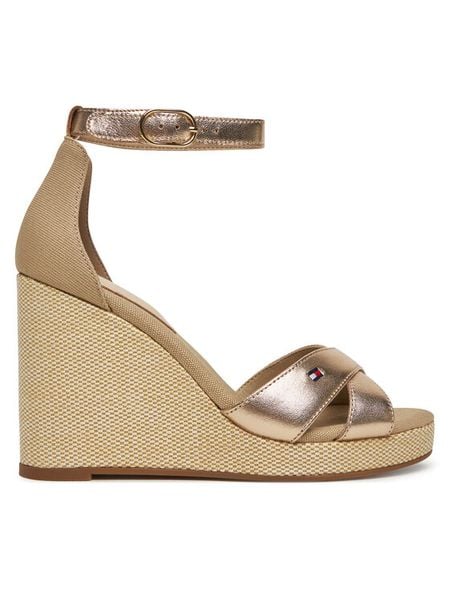 Tommy Hilfiger Sandały Flag Metallic High Wedge Espad FW0FW08811 Złoty. Żółte sandały damskie Tommy Hilfiger, bez wzorów, ze skóry, bez obcasa, na koturnie, bez zapięcia. Za 239.99 zł.