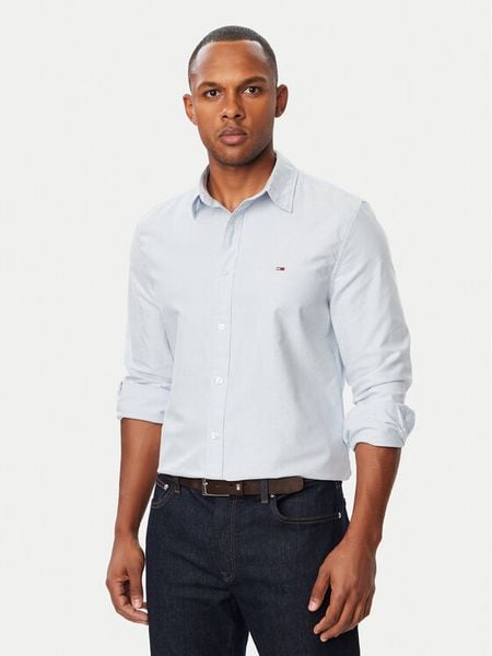 Tommy Jeans Koszula DM0DM23513 Niebieski jasny Regular Fit. Niebieskie koszule męskie Tommy Jeans, l, bez wzorów, z jeansu, bez kołnierzyka, bez ramiączek. Za 289.99 zł.